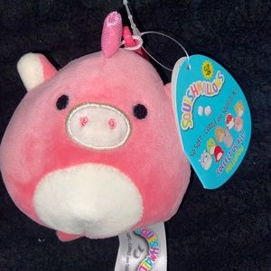 Two clip on squishmallows